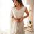 White Color Thread With Sequence Work Faux Georgette Lehenga Choli