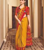 Yellow crepe silk printed saree with unstitched blouse