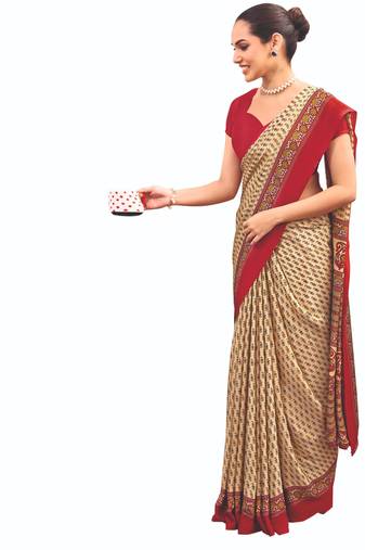 Cream crepe silk with traditional print saree with unstitched blouse piece