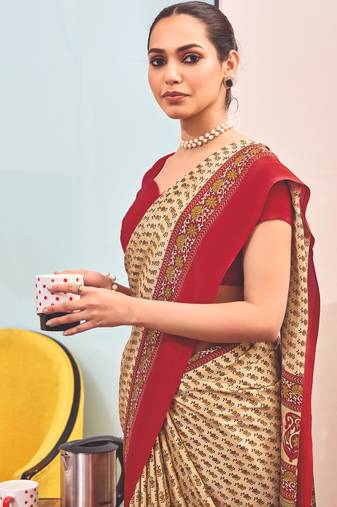 Cream crepe silk printed saree with unstitched blouse