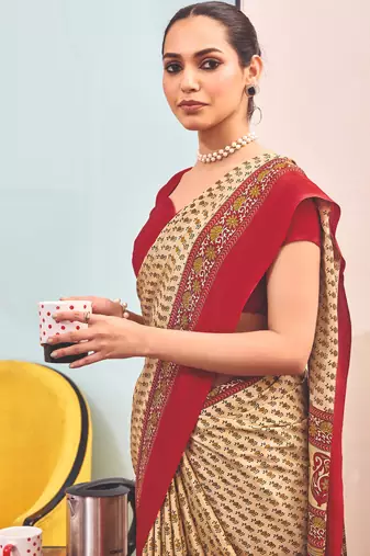 Cream crepe silk printed saree with unstitched blouse