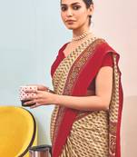 Cream crepe silk printed saree with unstitched blouse