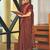 Red crepe silk with traditional print saree with unstitched blouse piece