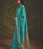 Sea green velvet tussar silk blend foilprint saree with unstitched blouse