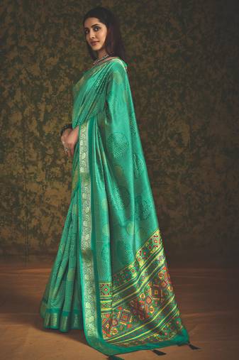 Bottle green velvet tussar silk blend foilprint saree with unstitched blouse