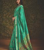 Bottle green velvet tussar silk blend foilprint saree with unstitched blouse