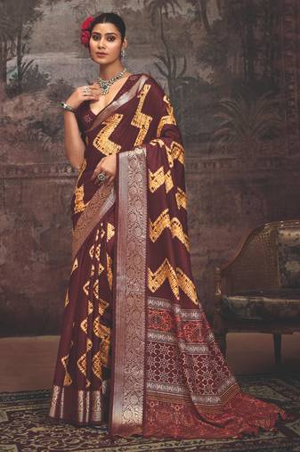 Maroon dolla silk blend self jaquard border saree with unstitched blouse