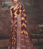 Maroon dolla silk blend self jaquard border saree with unstitched blouse