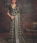 Dark grey dolla silk blend self jaquard border saree with unstitched blouse
