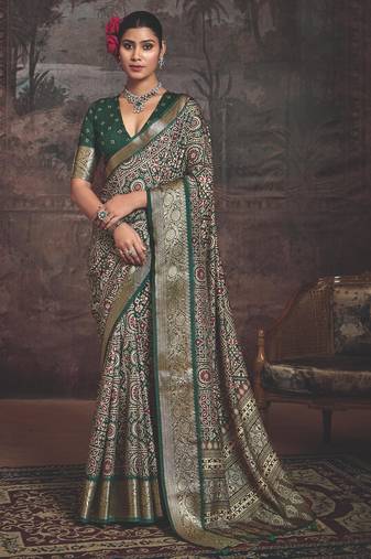 Green multi color dolla silk blend self jaquard border saree with unstitched blouse