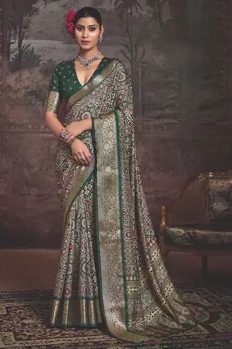 Green multi color dolla silk blend self jaquard border saree with unstitched blouse