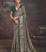 Green multi color dolla silk blend self jaquard border saree with unstitched blouse