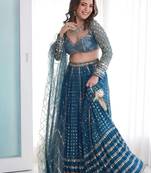 Blue georgette lehenga choli with silver sequin embroidered