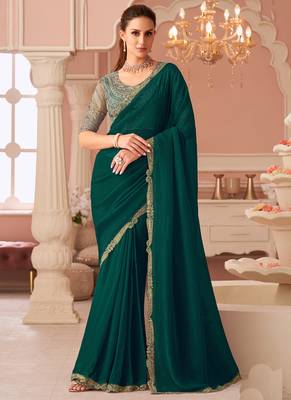 Green georgette embroidered party wear saree 1