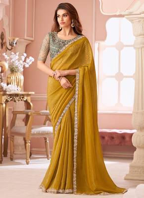 Yellow georgette embroidered party wear saree 1