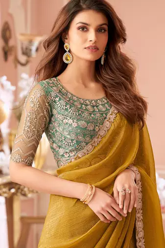 Yellow georgette embroidered party wear saree