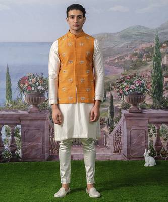 White plain chanderi silk kurta pajama with orange nehru jacket 1