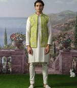 Green embroidered chanderi silk Nehru jacket paired with kurta pajama