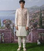 Pink embroidered chanderi silk nehru jacket paired with plain kurta pajama