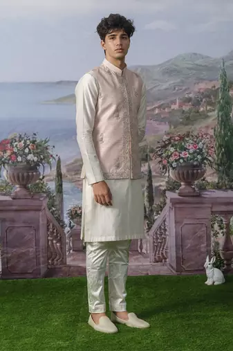 Pink embroidered chanderi silk nehru jacket paired with plain kurta pajama