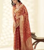 Dark orange woven linen tissue silk saree