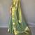 Greeen silk blend saree with unstitched blouse