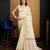 Cream organza saree with unstitched blouse