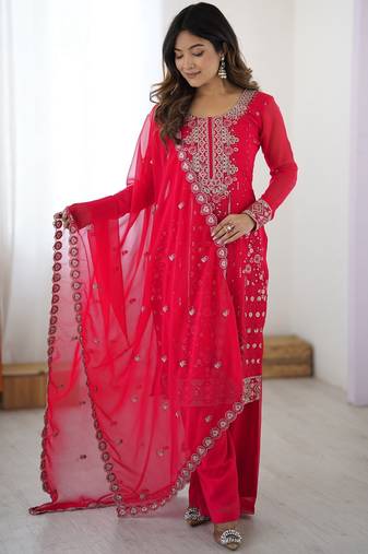 Elegant rani pink faux georgette palazzo suit with thread & sequin embroidery