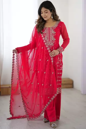 Elegant rani pink faux georgette palazzo suit with thread & sequin embroidery