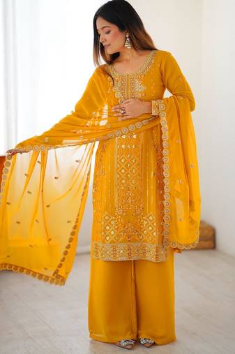 Elegant mustard yellow faux georgette palazzo suit with thread & sequin embroidery