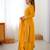 Elegant mustard yellow faux georgette palazzo suit with thread & sequin embroidery