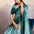 Teal blue satin crepe pearl lace border saree