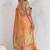 light orange soft tissue linen saree with blouse piece