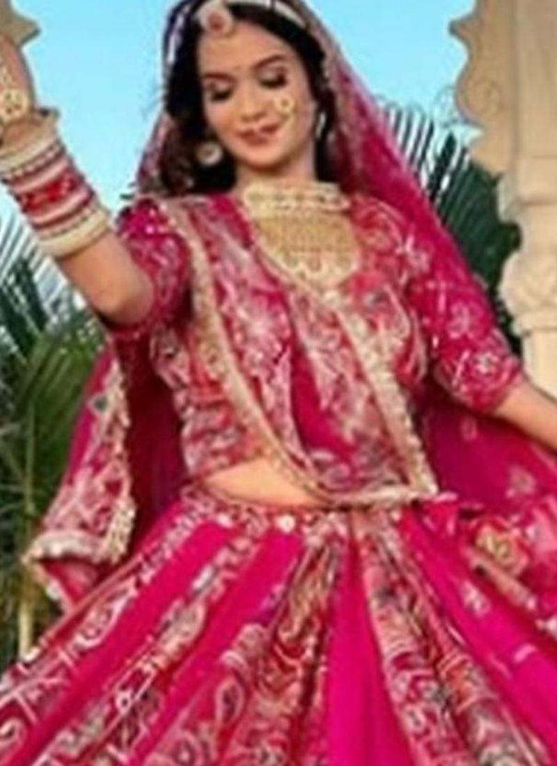 Regal Pink Lehenga with Intricate Embroidery, Mirror Work, and Patchwork Border