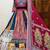 Multicolor Patchwork Lehenga with Intricate Embroidery and Vibrant Printed Dupatta