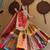 Vibrant Multicolor Lehenga with Patchwork Panels and Embellished Red Dupatta
