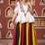 Colorful Traditional Bandhani Lehenga with Embroidered White Peplum Jacket
