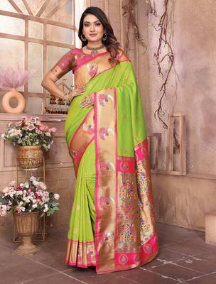 Light green silk blend zari weaving paithani saree with peacock border and pallu 1