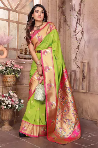 Light green silk blend zari weaving paithani saree with peacock border and pallu