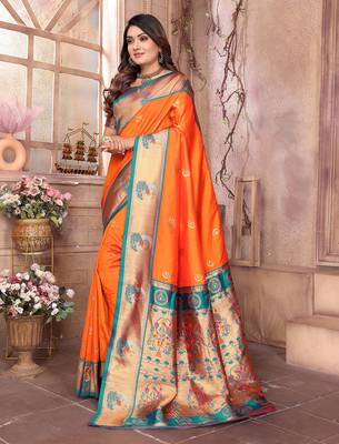 Orange silk blend zari weaving paithani saree with peacock border and pallu 2