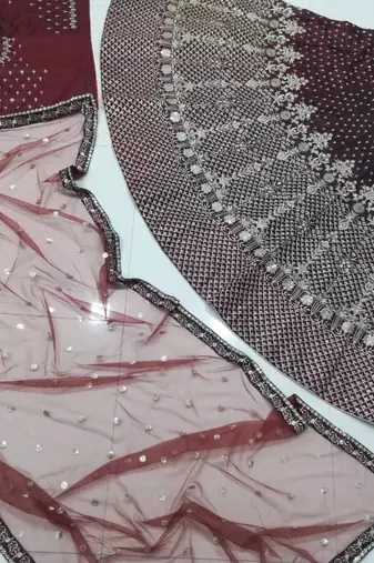 Maroon sequins and dori embroidered satin silk semi stitched lehenga choli
