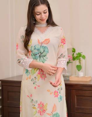Cream naylon taby print with thread embroidery work kurta pant set 4