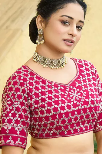 Cherry red zari and sequins embroidered faux georgette lehenga choli