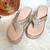 Beige woven leather wedges