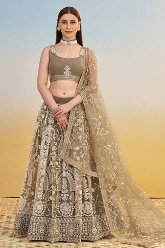 Ivory net lehenga with sequins and thread embroidery work