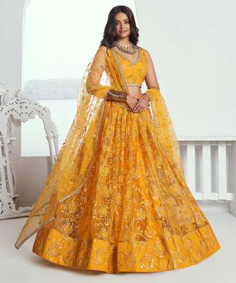 Yellow net lahenga with sequins and thread embroidered Lehenga Choli 1