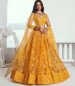 Yellow net lahenga with sequins and thread embroidered Lehenga Choli
