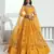 Yellow net lahenga with sequins and thread embroidered Lehenga Choli