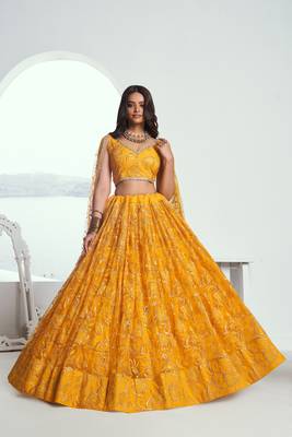 Yellow net lahenga with sequins and thread embroidered Lehenga Choli 2