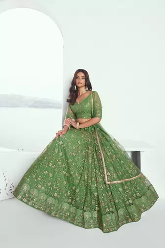 Pista green net lahenga with sequins and thread embroidered Lehenga Choli